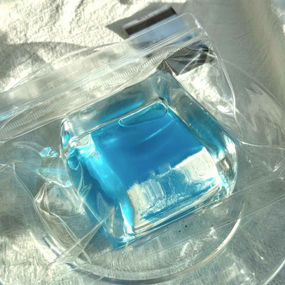 Squishy de bloque de hielo con arena fluida
