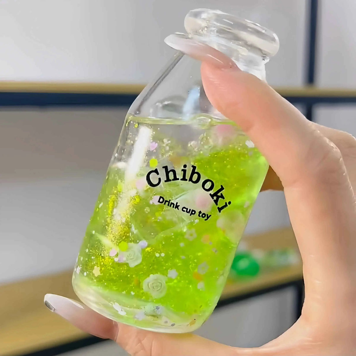 Squishies CHIBOKI de botellas con arena por capas
