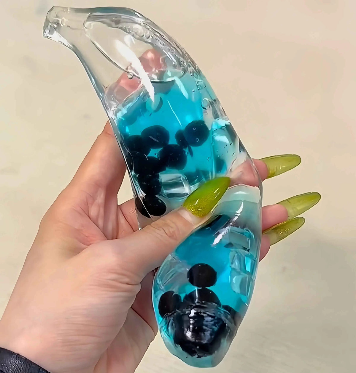 Squishies CHIBOKI de plátano con arena fluida