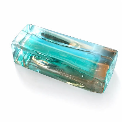 Squishy de bloque de menta con arena por capas