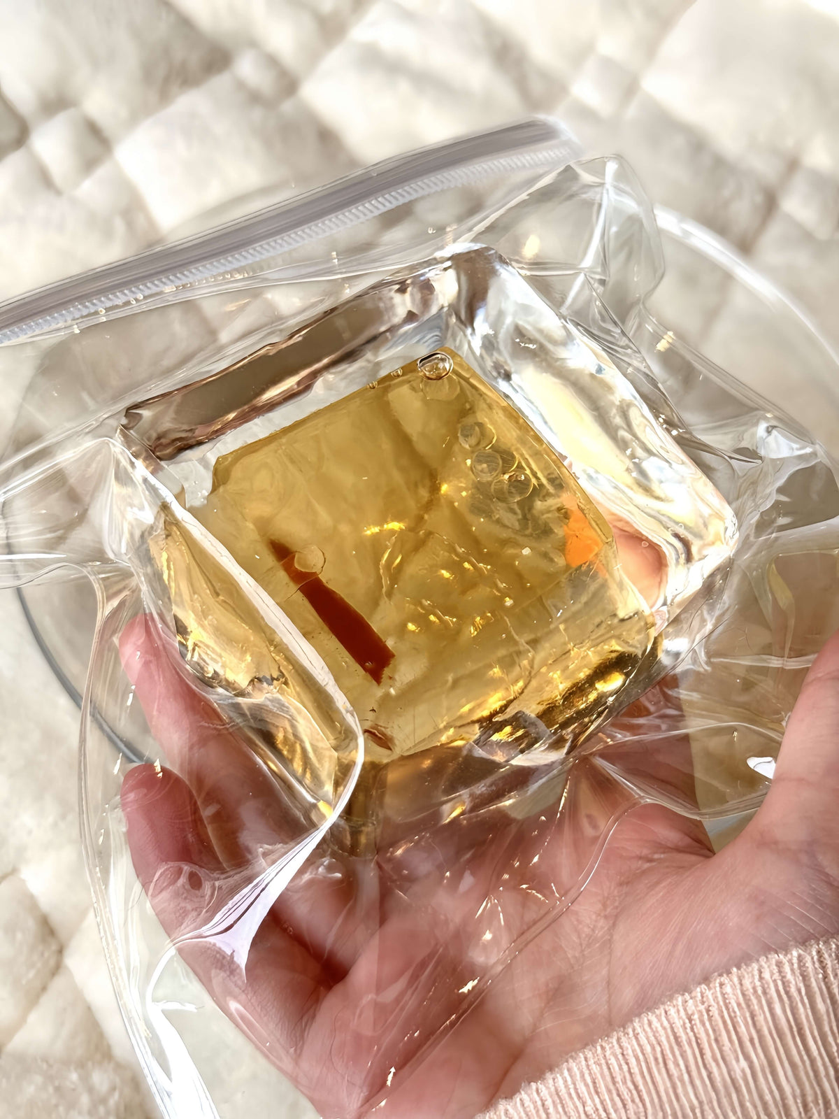 Squishy de bloque de hielo con arena fluida