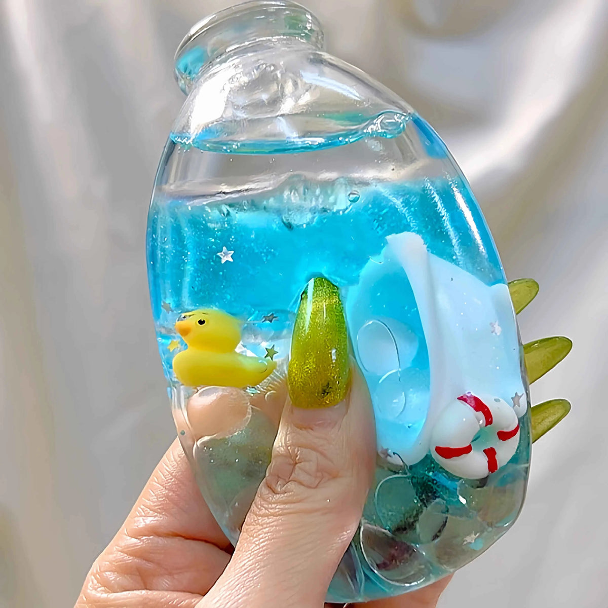 Squishies CHIBOKI de botellas cristalinas