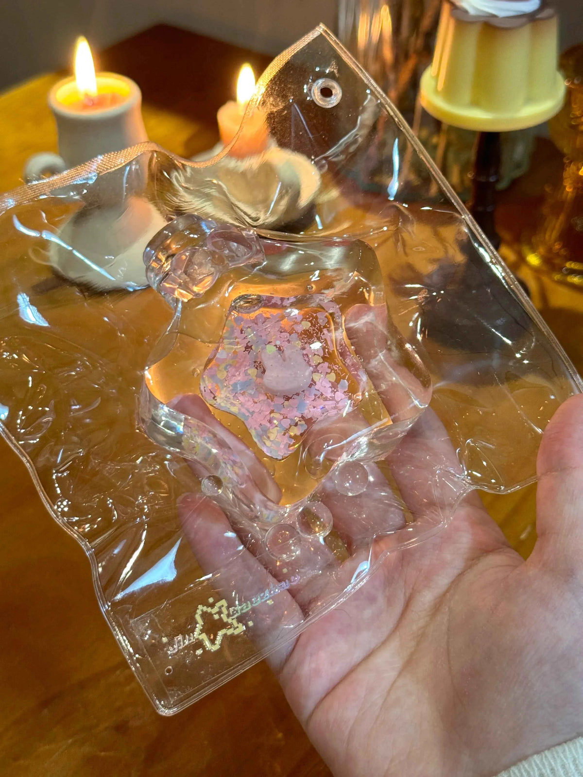 Squishy de botella estrella con arena fluida
