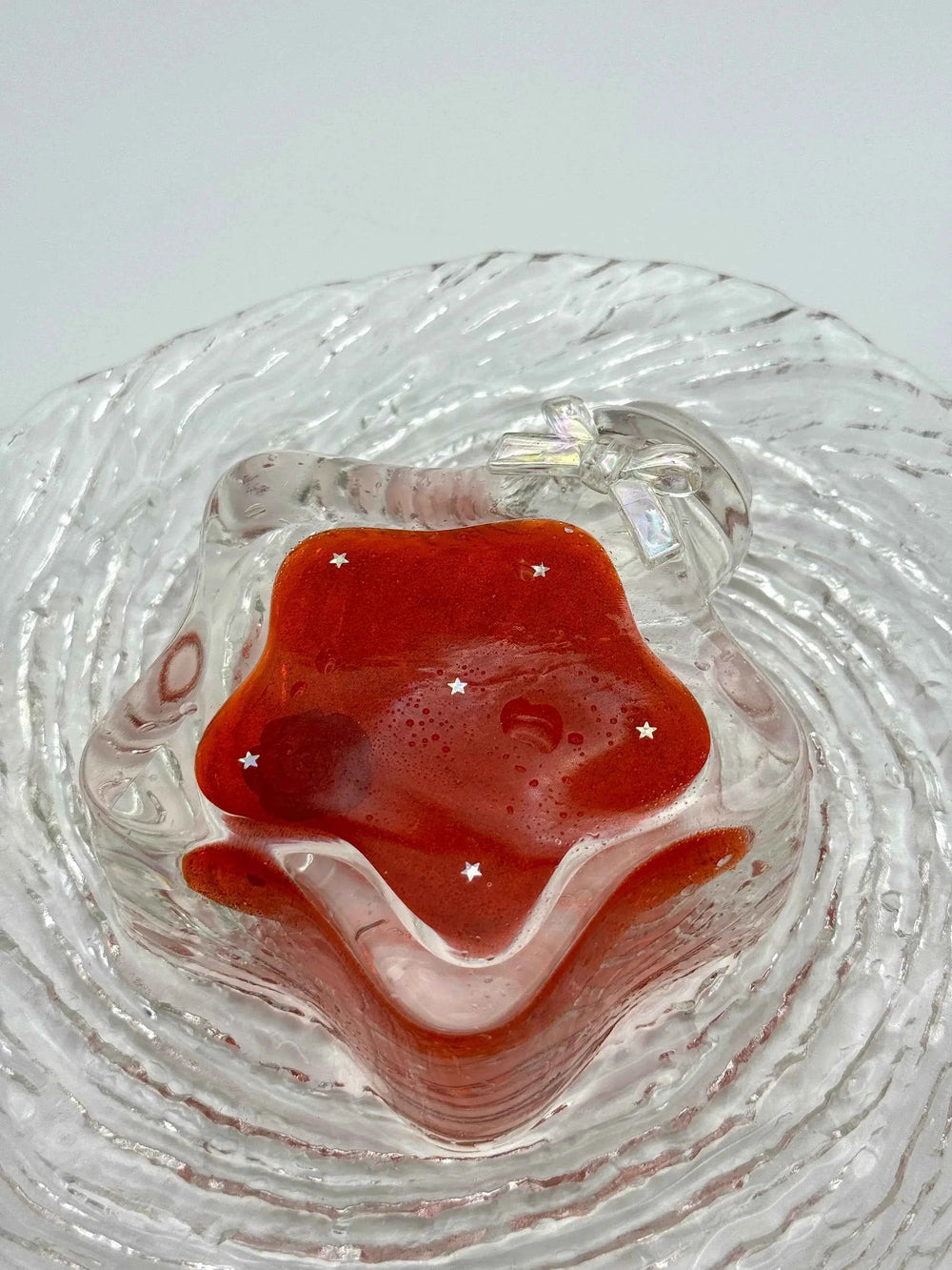 Squishy de botella estrella con arena fluida