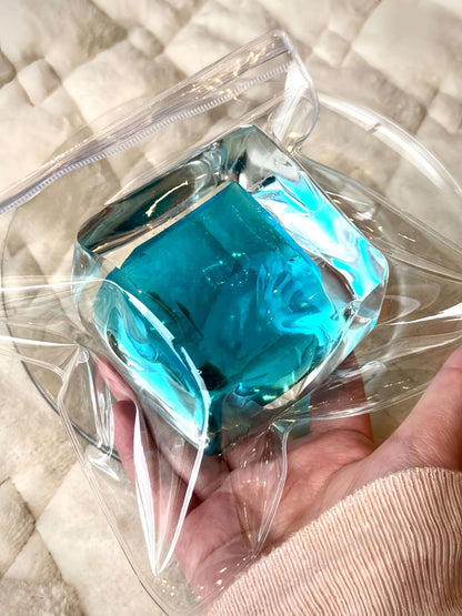 Squishy de bloque de hielo con arena fluida
