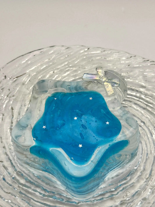 
Squishy de botella estrella con arena fluida