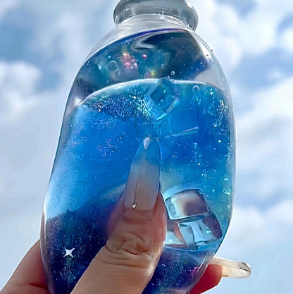 Squishies CHIBOKI de botellas con arena por capas