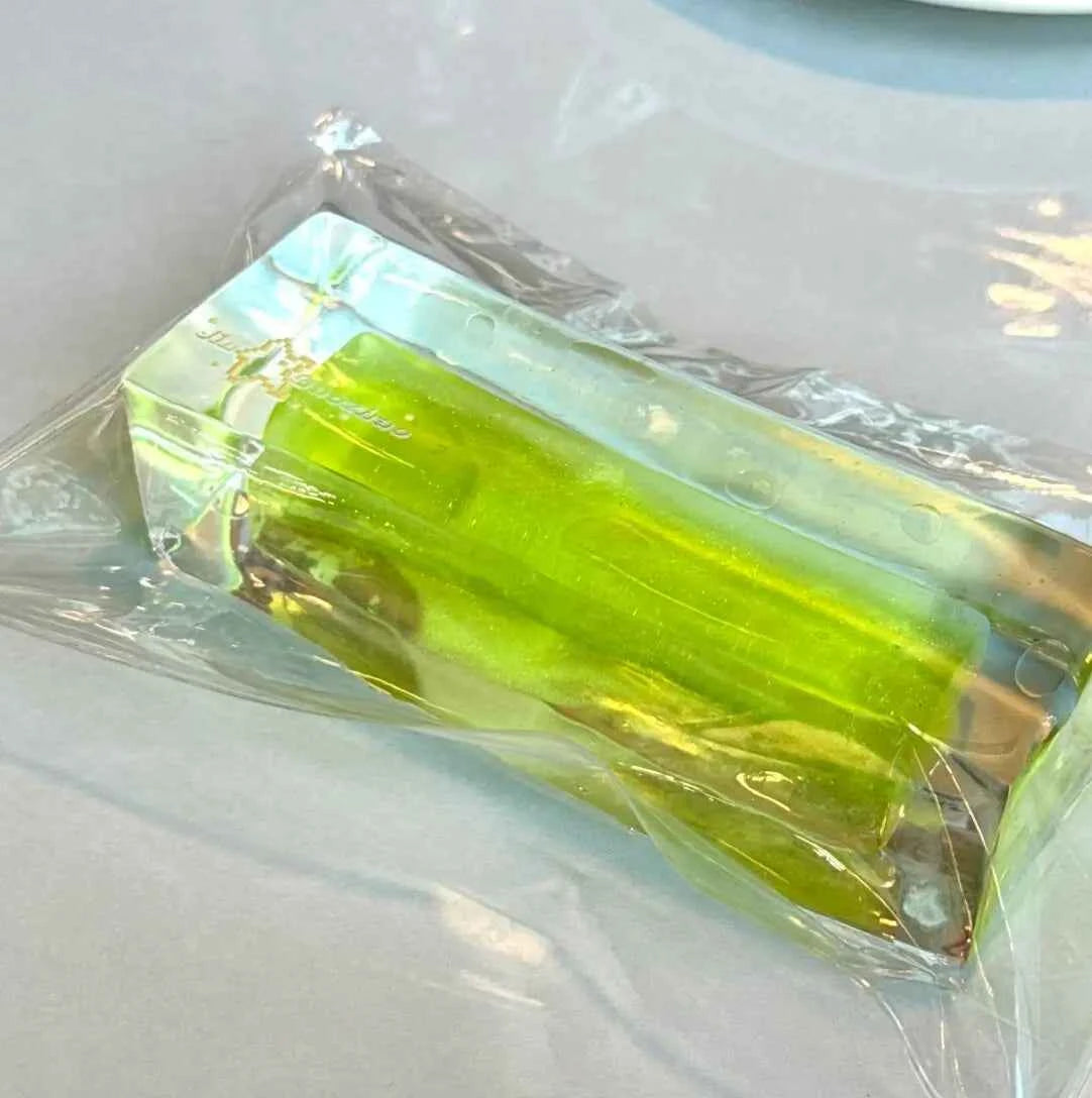 Squishy de bloque de menta con arena por capas