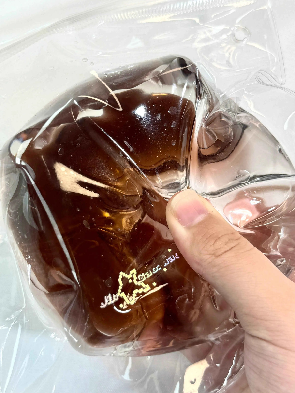 Squishy de bloque de hielo con arena fluida