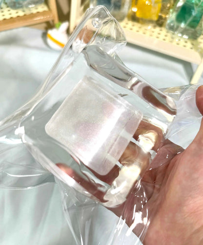 Squishy de bloque de hielo con arena fluida