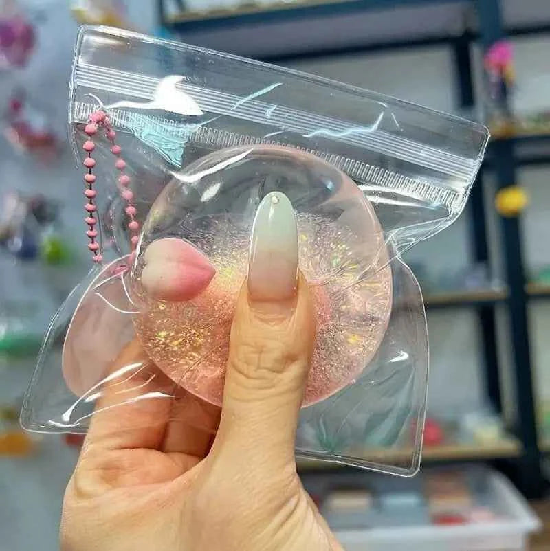 Pelota squishy artesanal de gel por capas