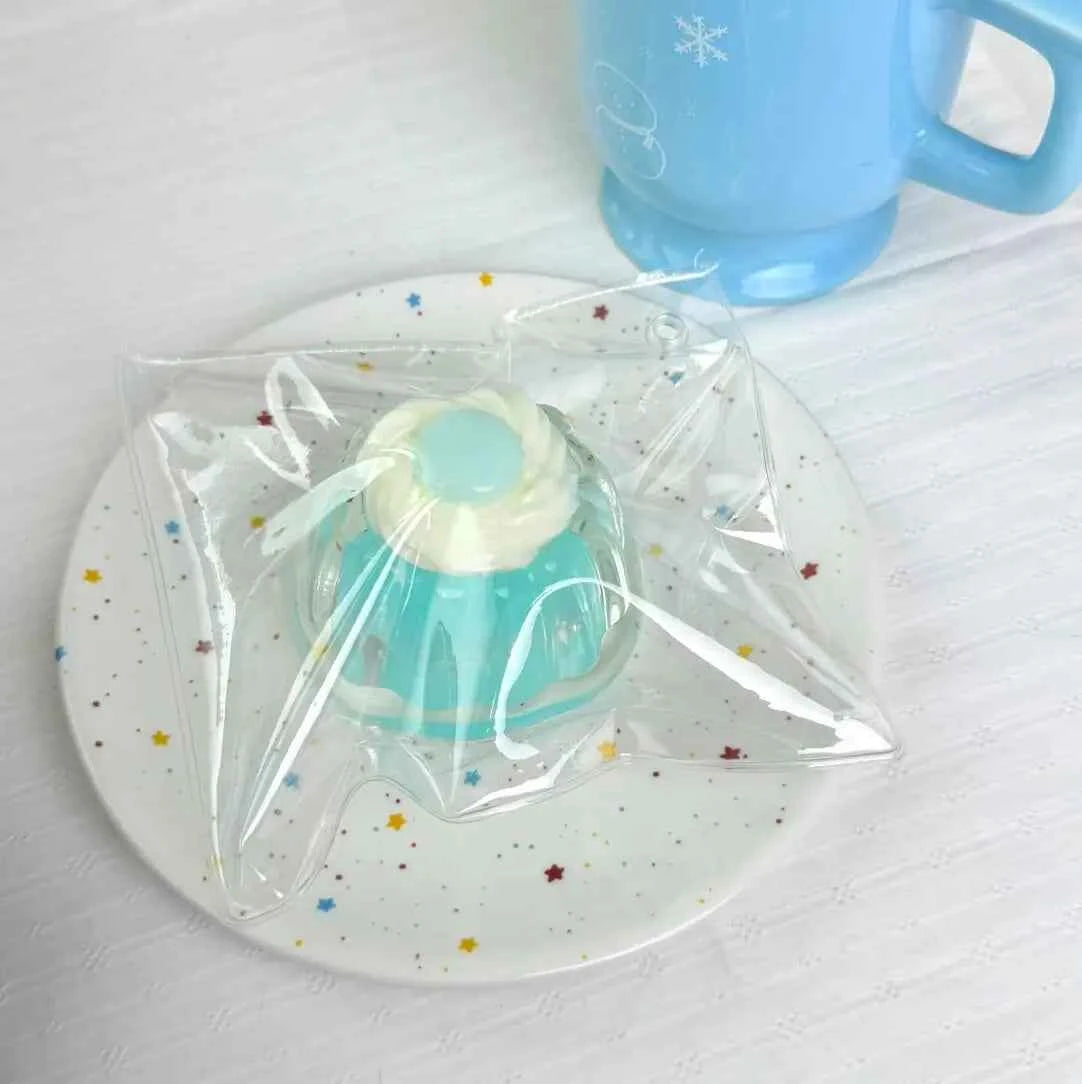 Squishy de pudin nevado con arena fluida
