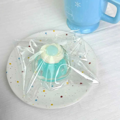 Squishy de pudin nevado con arena fluida