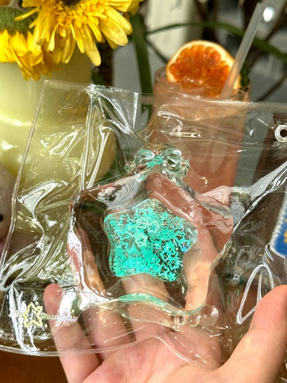Squishy de botella estrella con arena fluida
