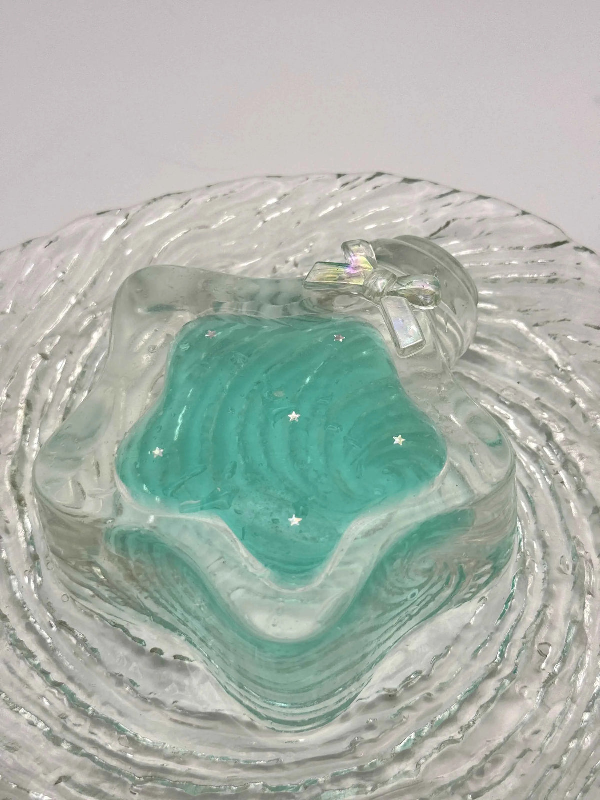 Squishy de botella estrella con arena fluida
