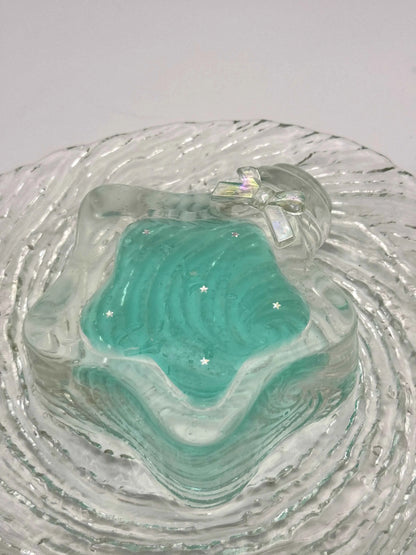 Squishy de botella estrella con arena fluida