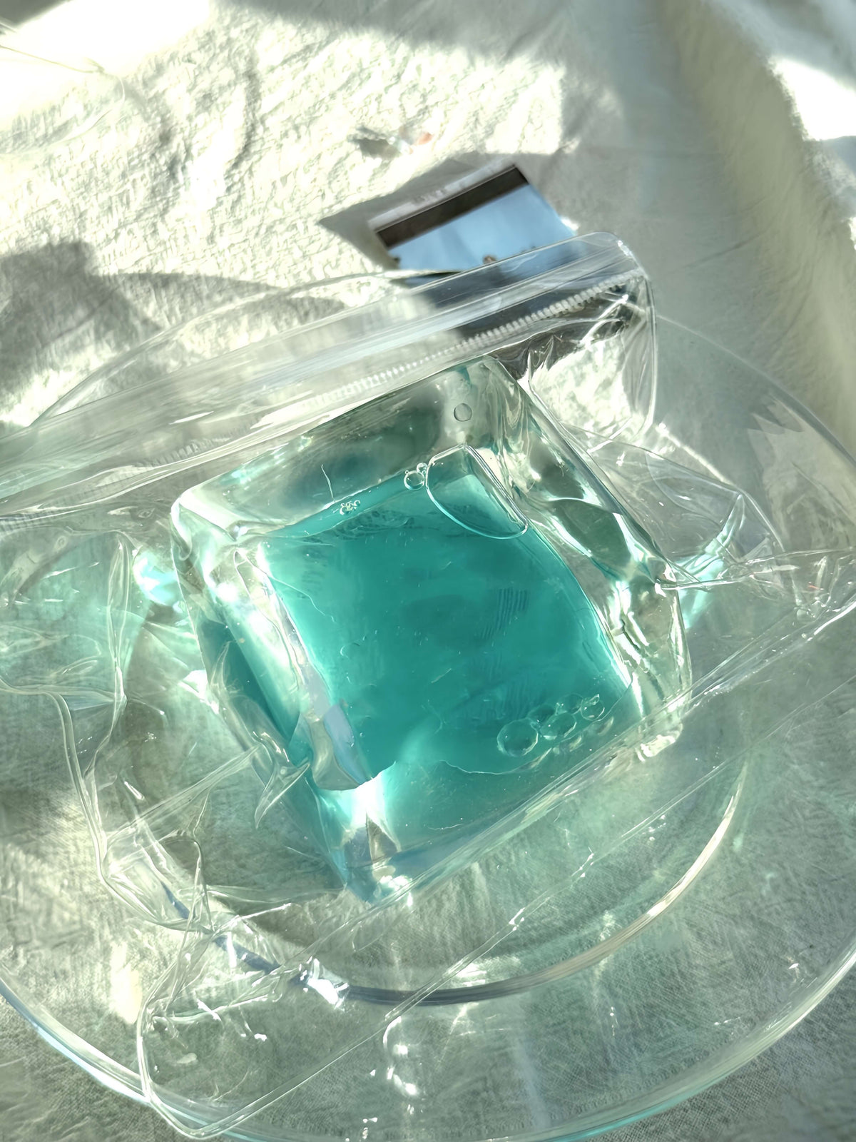 Squishy de bloque de hielo con arena fluida