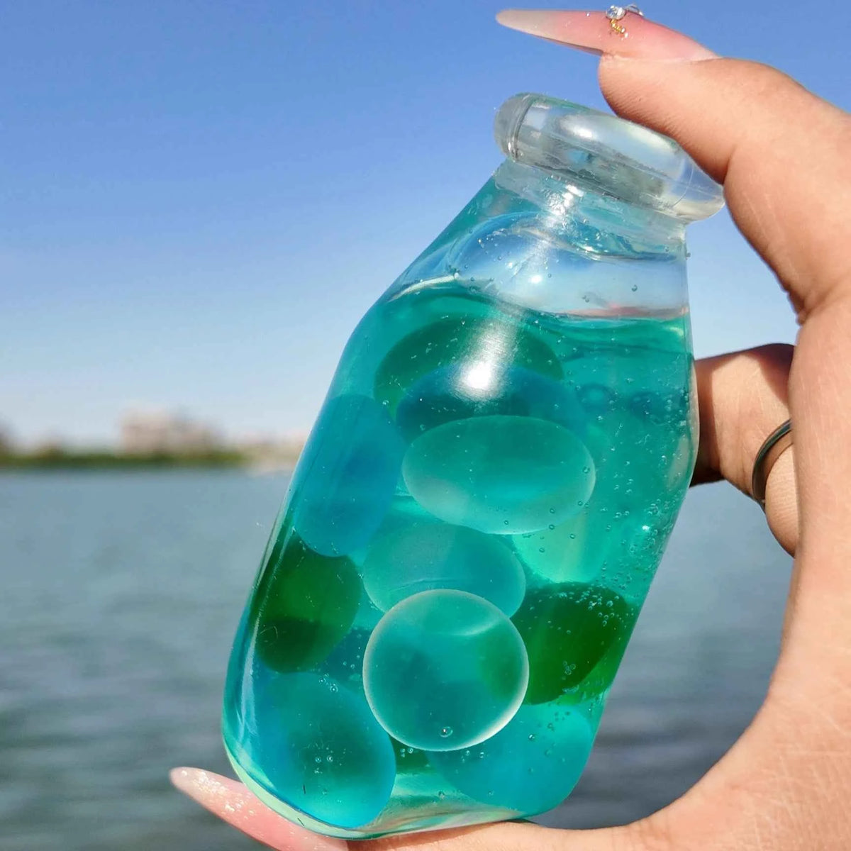 Squishies CHIBOKI de botellas transparentes