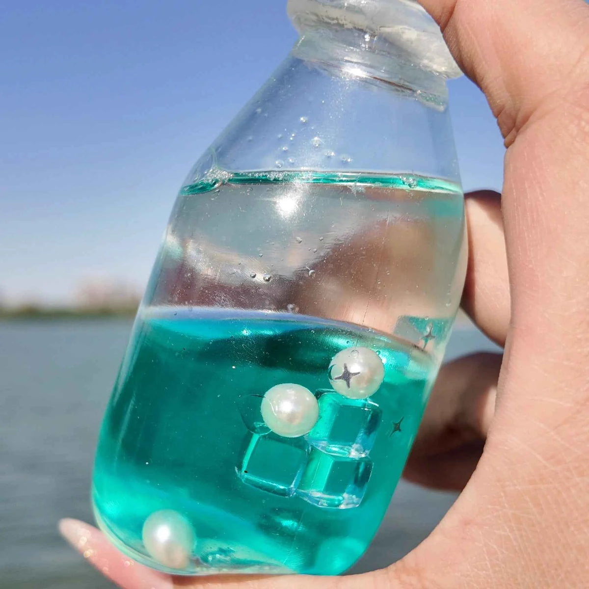 Squishies CHIBOKI de botellas con arena por capas