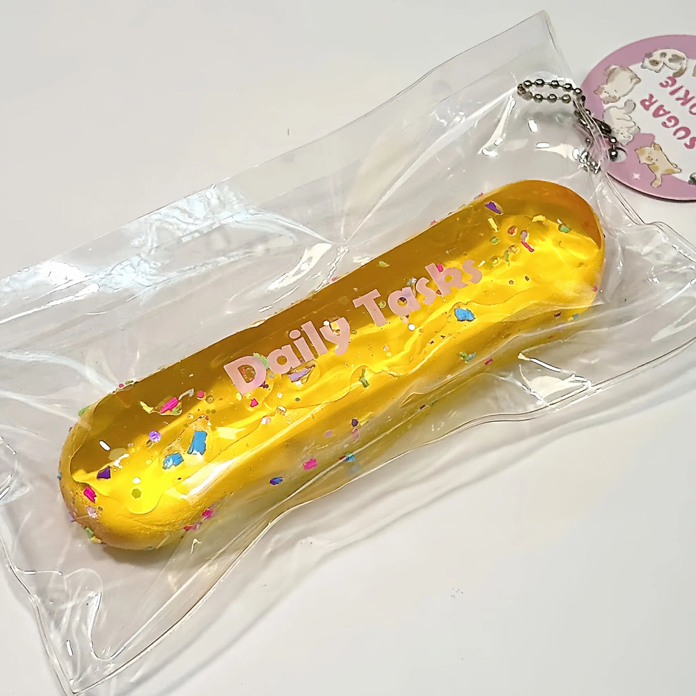 Squishy Milk Stick con purpurina y cadena