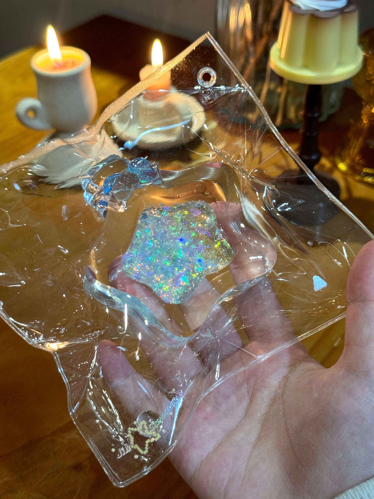 Squishy de botella estrella con arena fluida