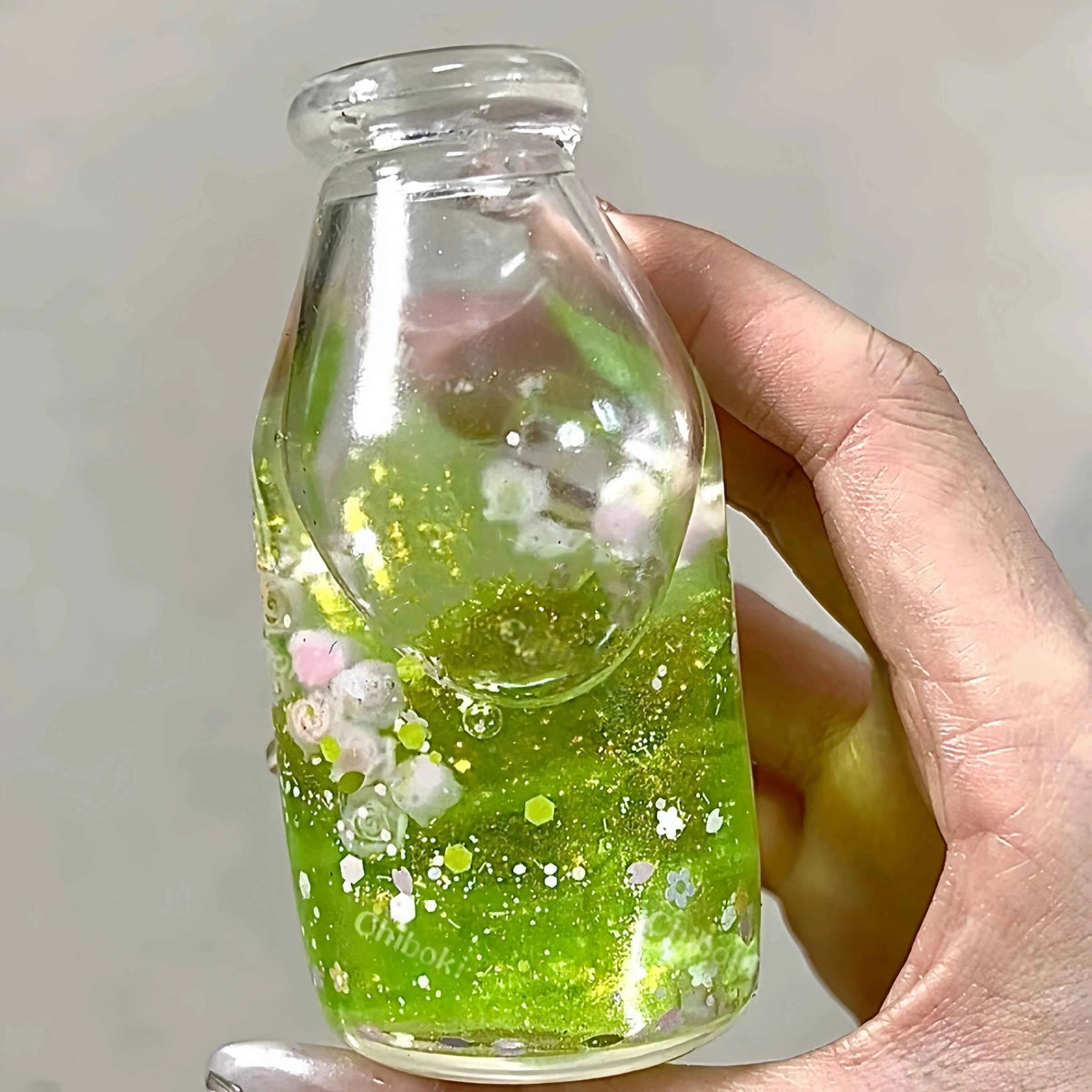 Squishies CHIBOKI de botellas con arena por capas