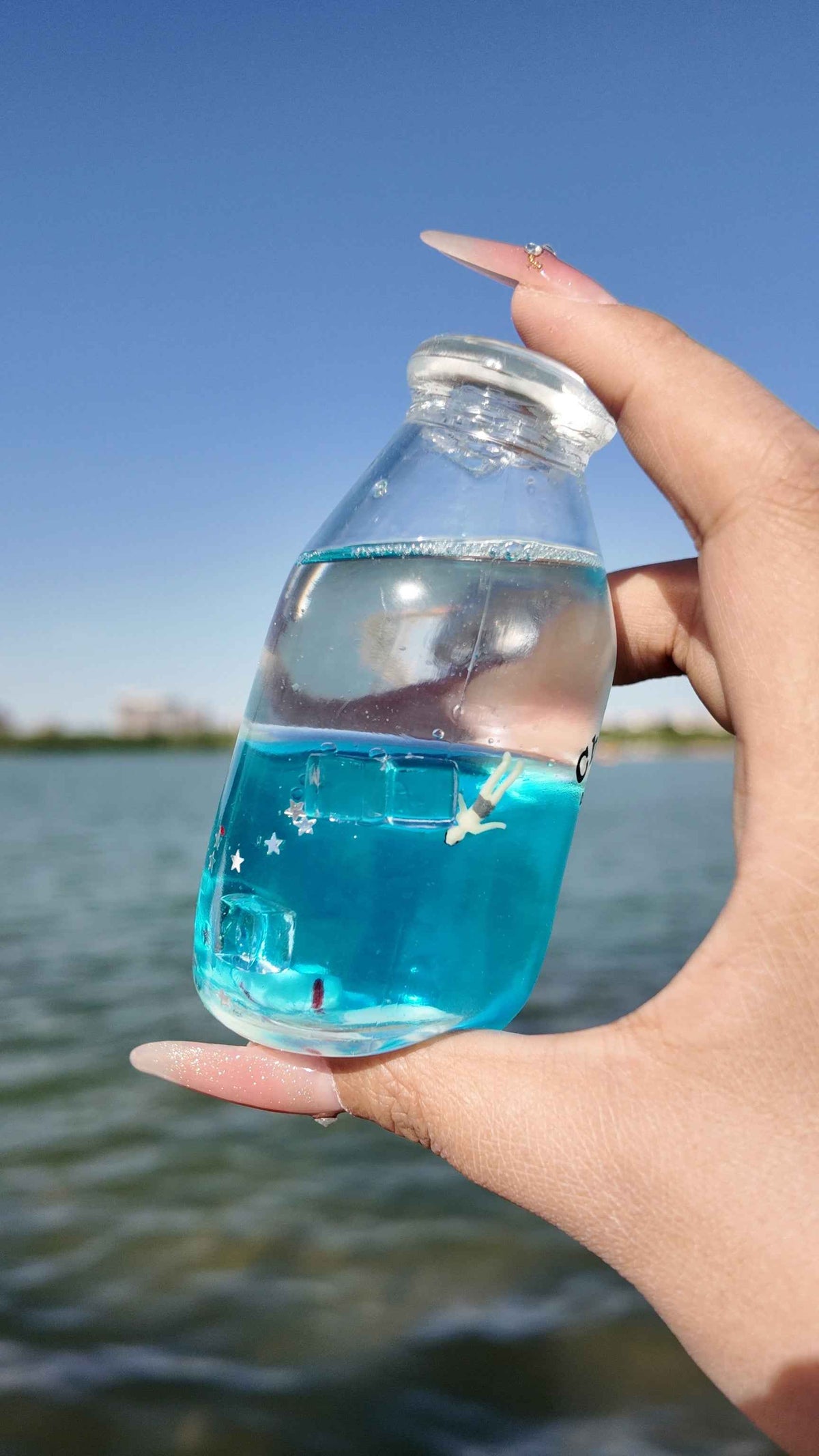 Squishies CHIBOKI de botellas con arena por capas