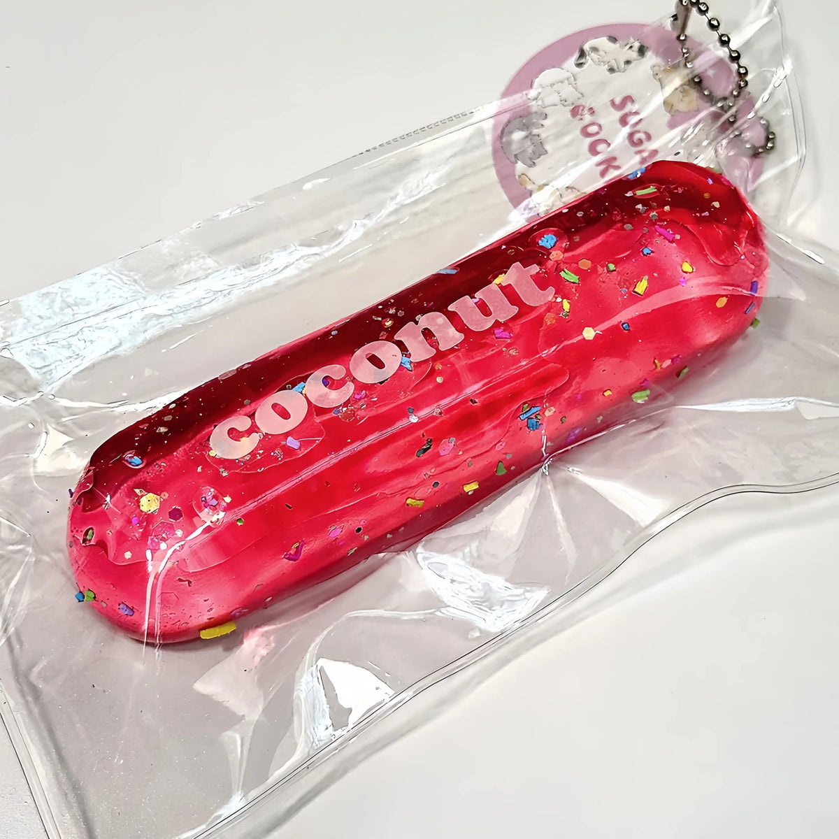 Squishy Milk Stick con purpurina y cadena