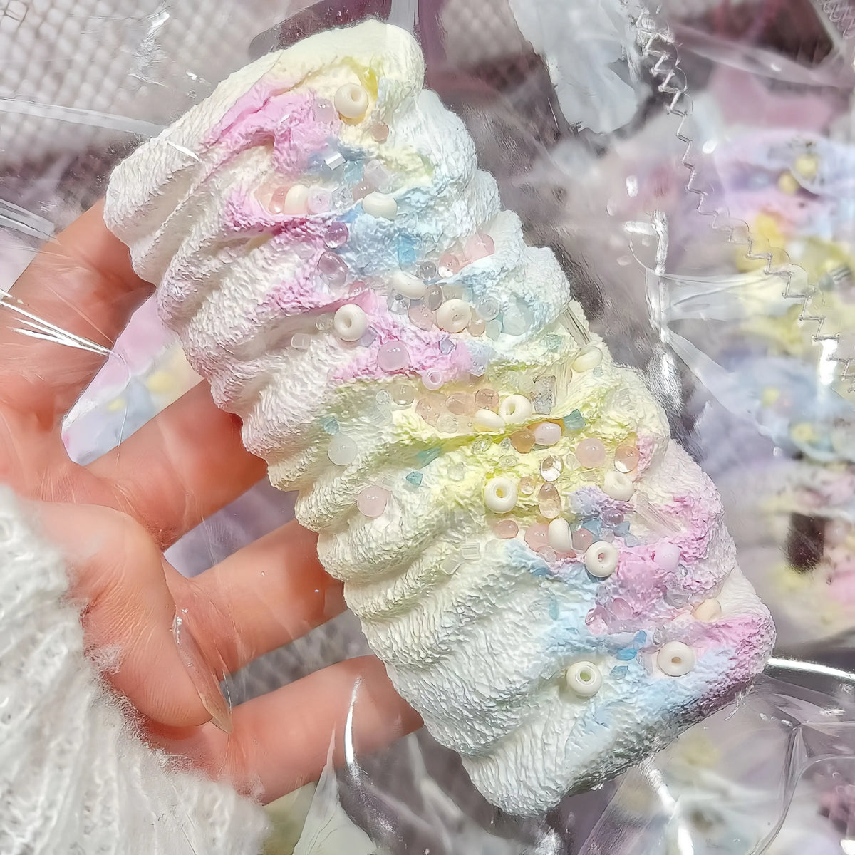 Squishy de bizcocho enrollado con crema y textura