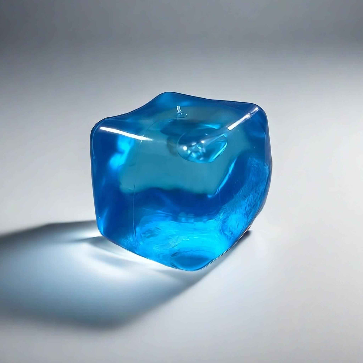 Squishy de bloque de hielo con arena fluida