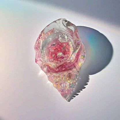 Squishy de concha con purpurina holográfica