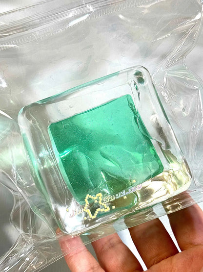 Squishy de bloque de hielo con arena fluida
