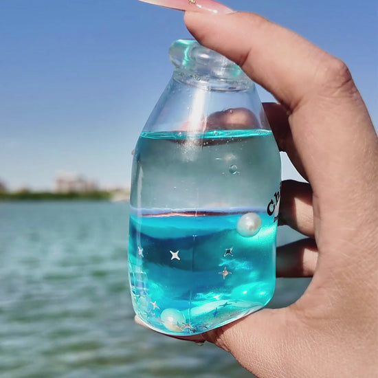 Squishies CHIBOKI de botellas con arena por capas