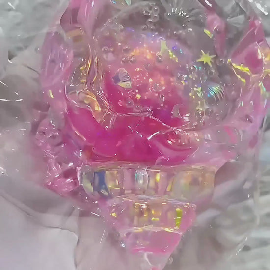 Squishy de concha con purpurina holográfica