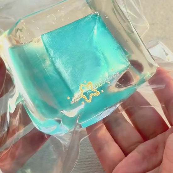 Squishy de bloque de hielo con arena fluida